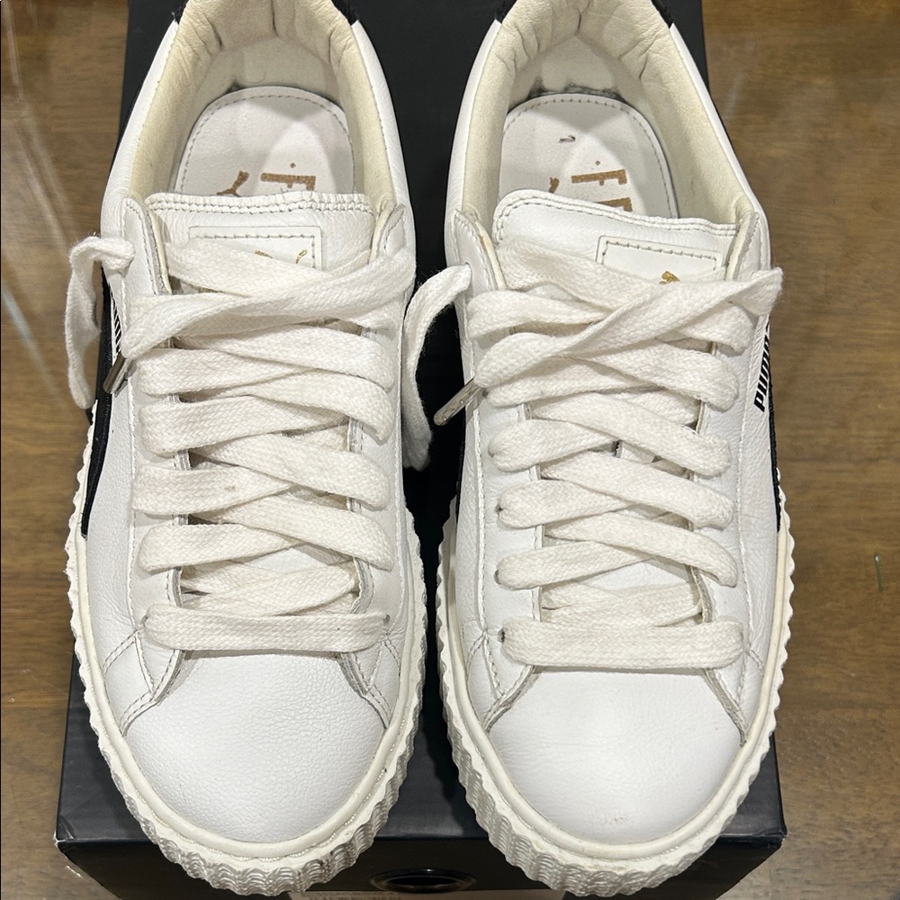 Puma White Sneakers with Black Stripe
